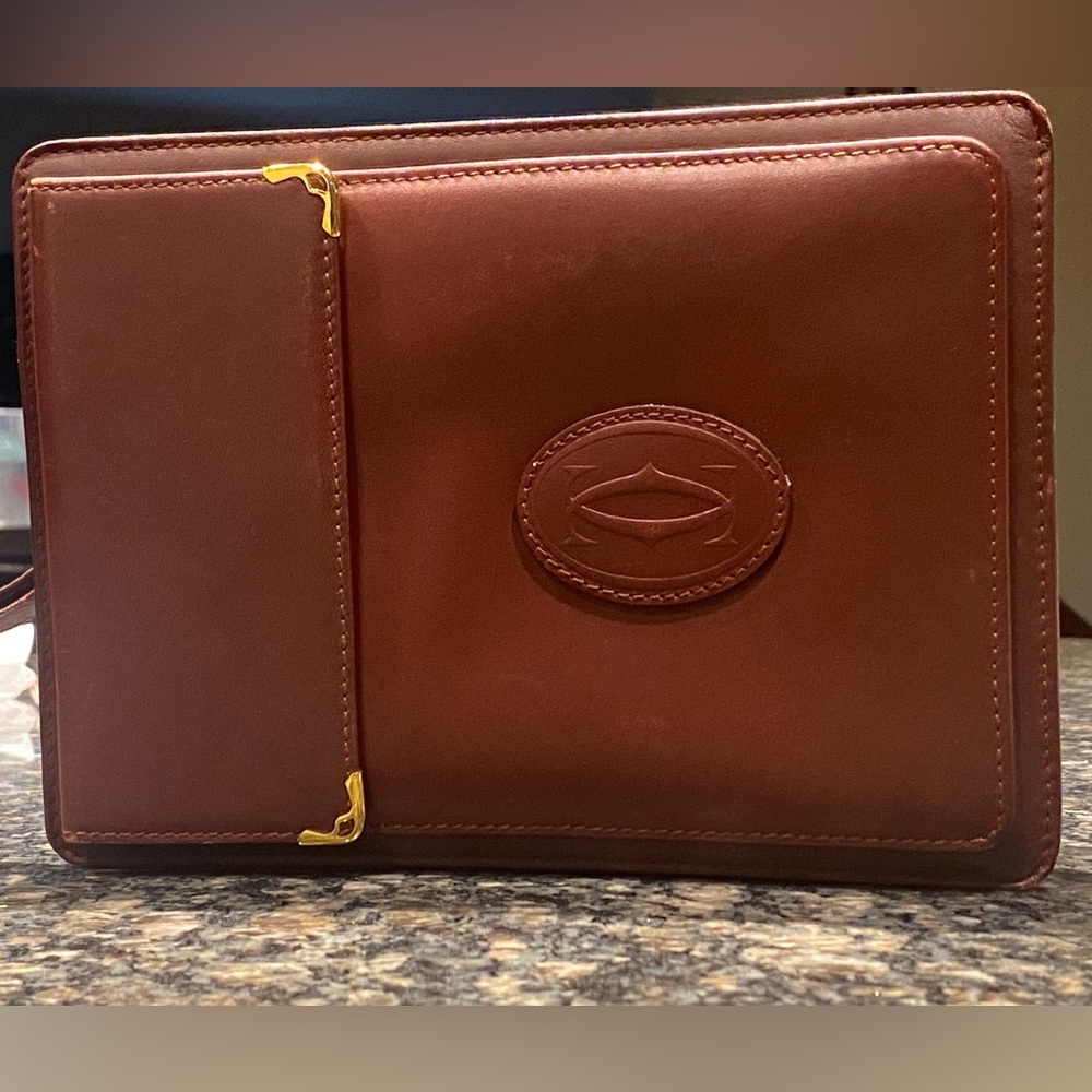 Rare, vintage Must De Cartier horizontal Clutch, with wristlet attachment.